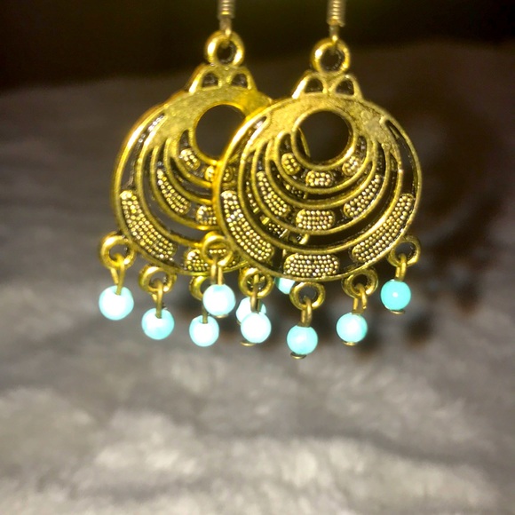 bronze-colored bohemian style earrings with turquoise beads. Super cute! - Picture 2 of 2